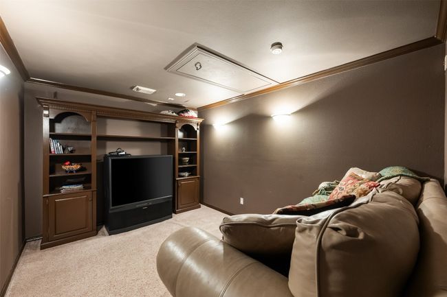 One more room off of the game room! A full blown theatre room for movie nights. | Image 24