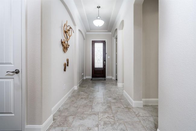 Tiled flooring throughout most of home. | Image 6