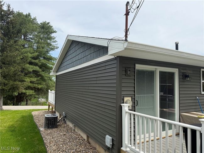 View of home's exterior with central AC unit | Image 21