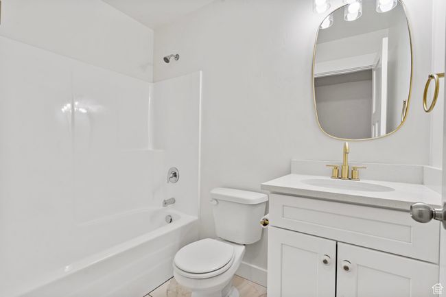 Bathroom with shower / bathtub combination and vanity | Image 17