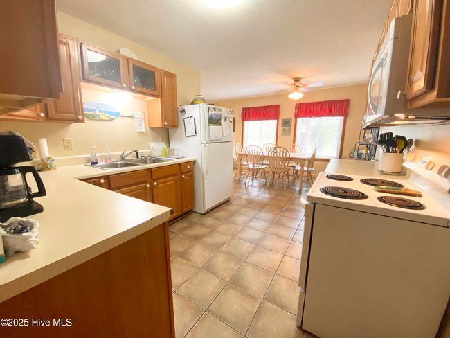201 Ne 48 Th St, House other with 3 bedrooms, 2 bathrooms and 1 parking in Oak Island NC | Image 8
