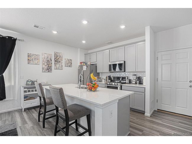 20932 E 60 Th Ave, Townhouse with 3 bedrooms, 3 bathrooms and null parking in Aurora CO | Image 9