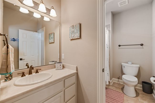Split Bathroom featuring vanity and tile patterned floors | Image 23