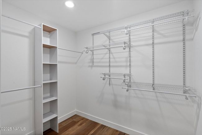 Primary walk in closet | Image 19