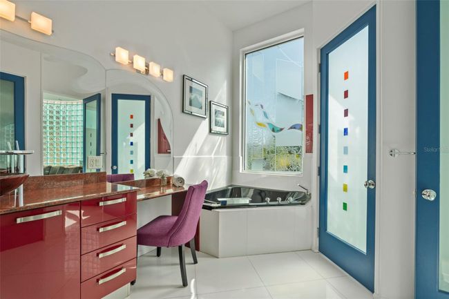 Owner's suite spa-like bath with jetted tub | Image 17