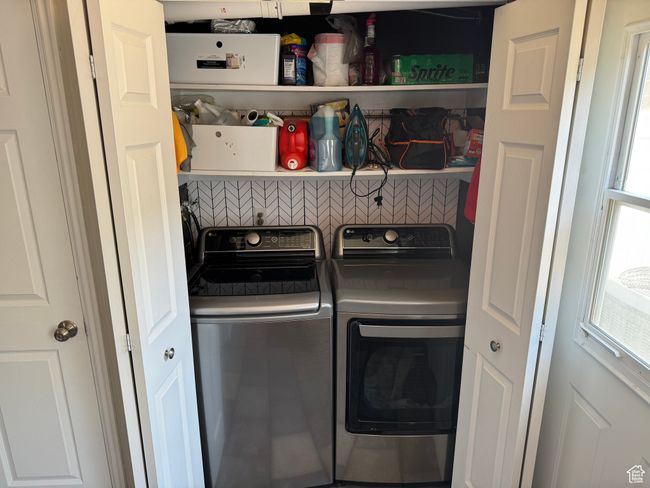 Laundry area featuring separate washer and dryer | Image 10