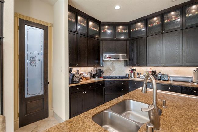 and providing a large pantry with direct access from the | Image 14
