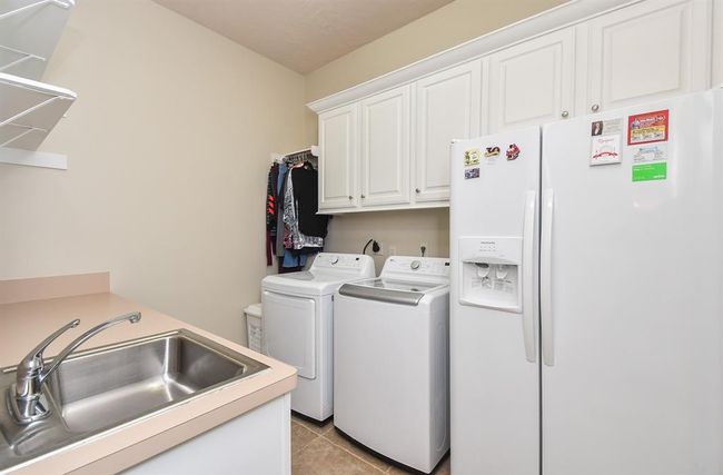 In Home Laundry Room. with room for a deep freezer for extra food storage for those big family dinners. | Image 43