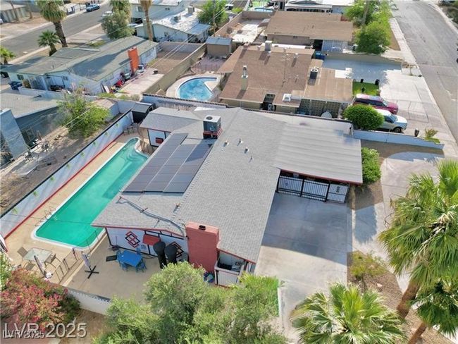 Aerial view of residential area with a pool | Image 27