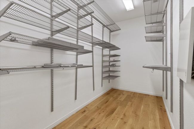 Primary closet with plenty of storage | Image 18