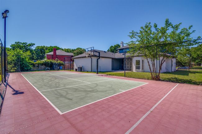 View of tennis court with community basketball court | Image 25