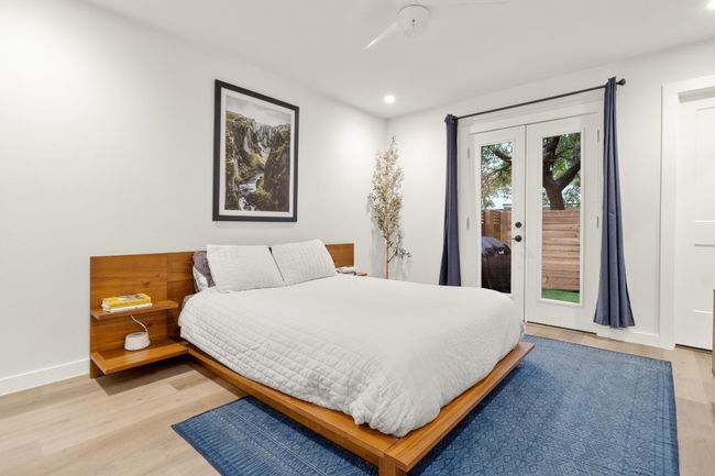 Bedroom with access to outside, recessed lighting, light wood-style floors, french doors, and baseboards | Image 10