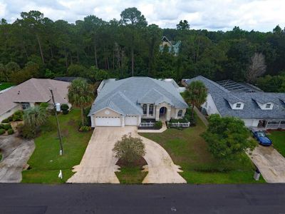 39 Woodhollow Lane, House other with 4 bedrooms, 3 bathrooms and null parking in Palm Coast FL | Image 3