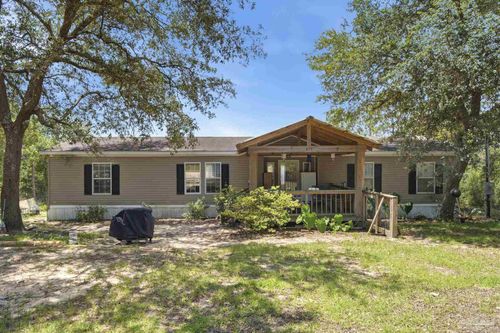 439 Woodpecker Ln, Holt, FL, 32564-8308 | Card Image