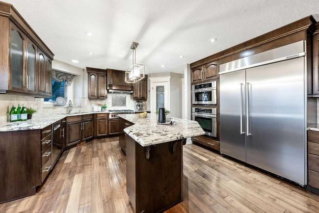 169 Signature Way Sw, House other with 5 bedrooms, 4 bathrooms and 4 parking in Calgary AB | Image 15