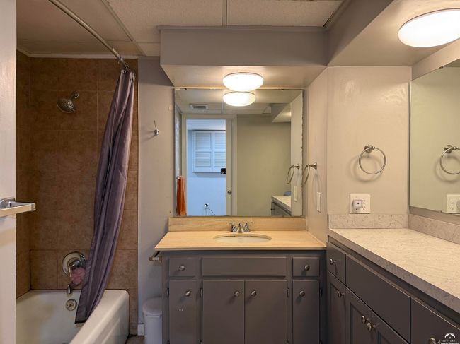 Dedicated to the 4th bedroom the low vanity and high vanity counters are a great place to make up. | Image 45