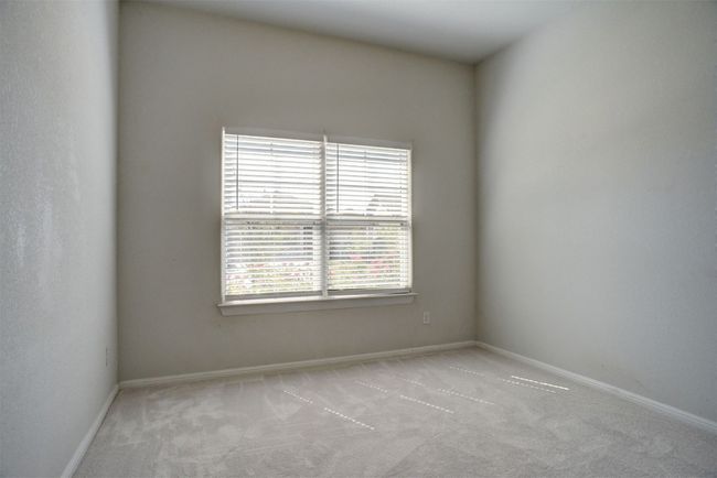 Empty room featuring carpet flooring and baseboards | Image 27