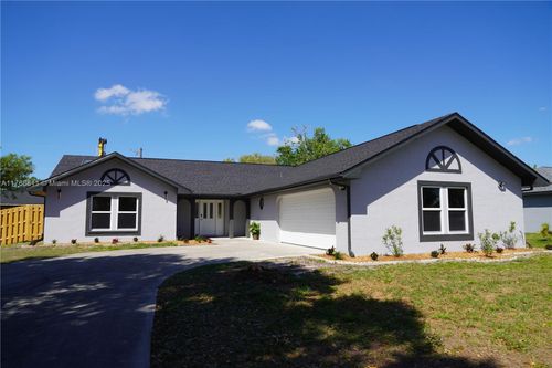 563 Presque Isle Dr, Port Charlotte, FL, 33954-3317 | Card Image