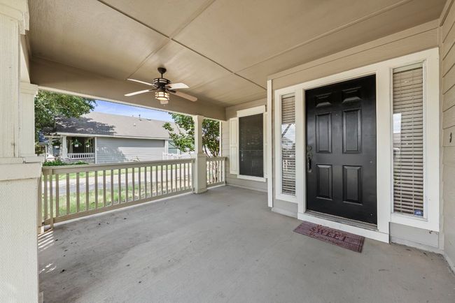 View of exterior entry with a porch and ceiling fan | Image 4