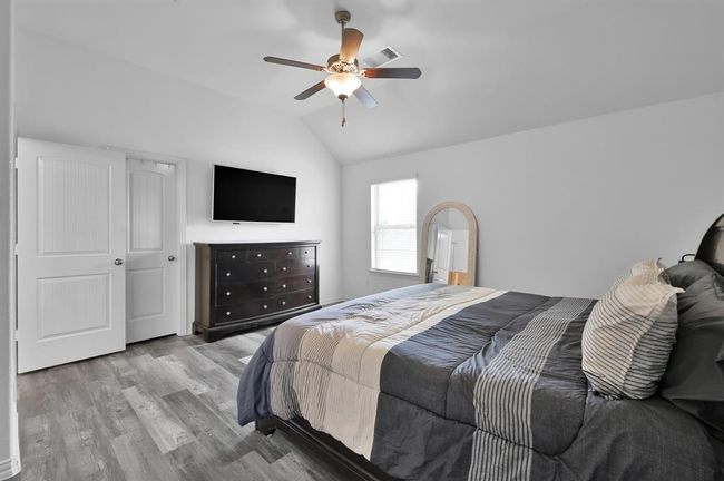 Primary bedroom with a large walk in closet. | Image 23