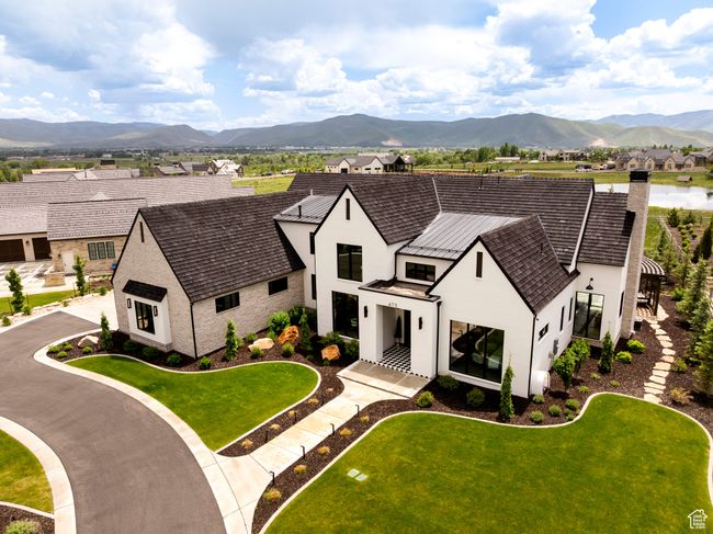 Aerial view of property and surrounding area with mountains | Image 68