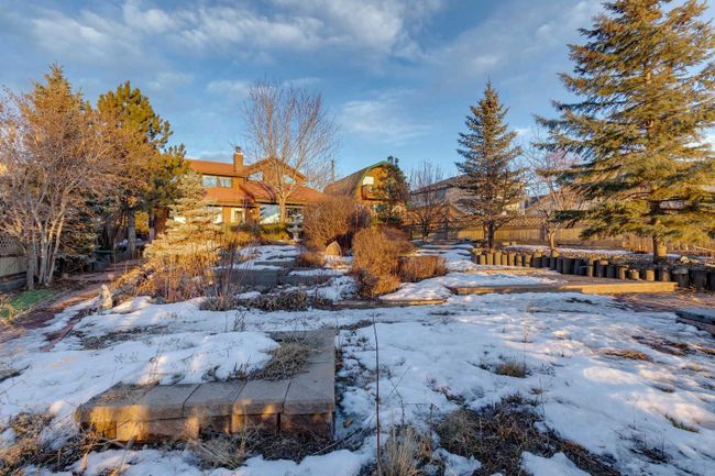 305 East Chestermere Drive, Home with 4 bedrooms, 2 bathrooms and 6 parking in Chestermere AB | Image 44