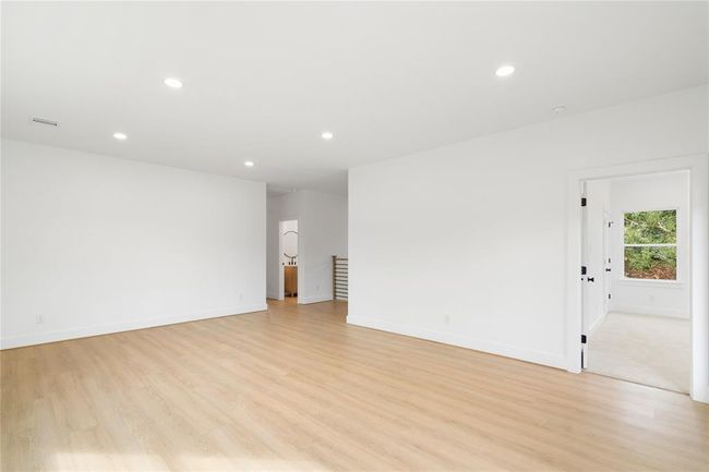 Primary bedroom is located upstairs - view from the Game room into the Primary Bedroom | Image 23