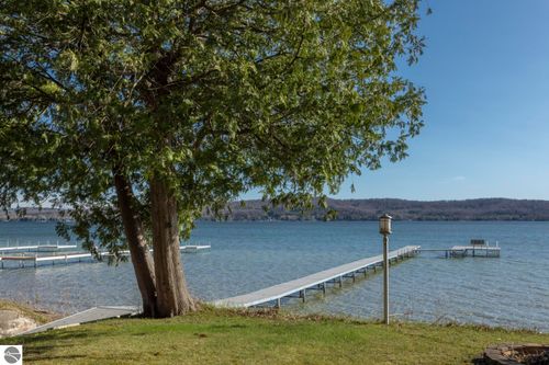 7753 Woodland Dr, Honor, MI, 49640-9494 | Card Image