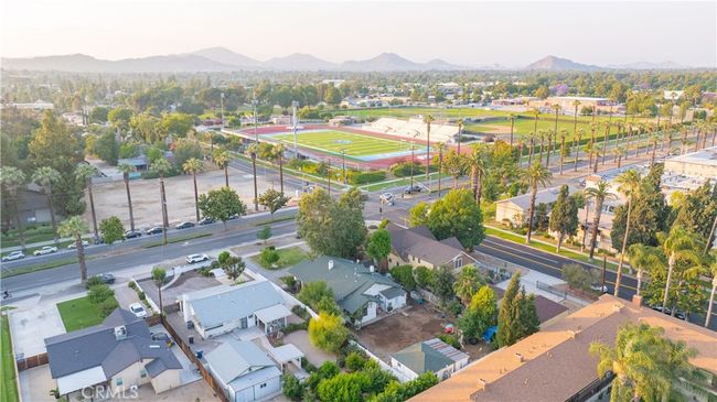 Bird’s-eye views show lot depth, neighborhood proximity, and scale of both main and guest structures. | Image 60