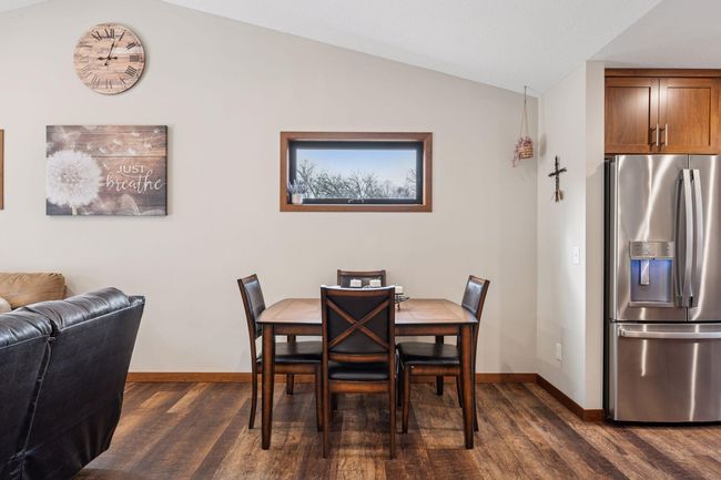 Dedicated Dining Room with Transom Window for added natural light | Image 12