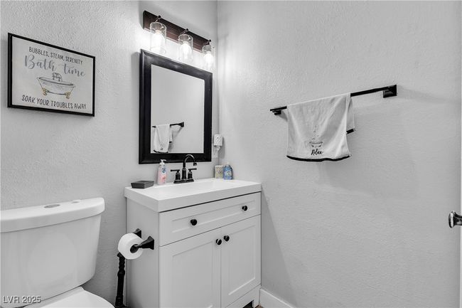 Half bath with toilet and vanity | Image 28