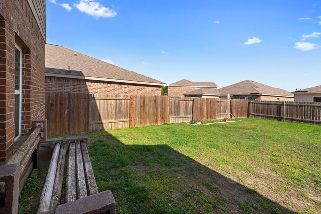 View of yard with a fenced backyard | Image 36