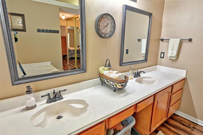 Spacious vanity with stylish dual sinks for added convenience and elegance. | Image 22