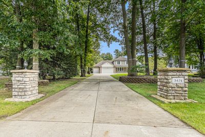 15426 Forest Park Drive, House other with 4 bedrooms, 3 bathrooms and null parking in Grand Haven MI | Image 2