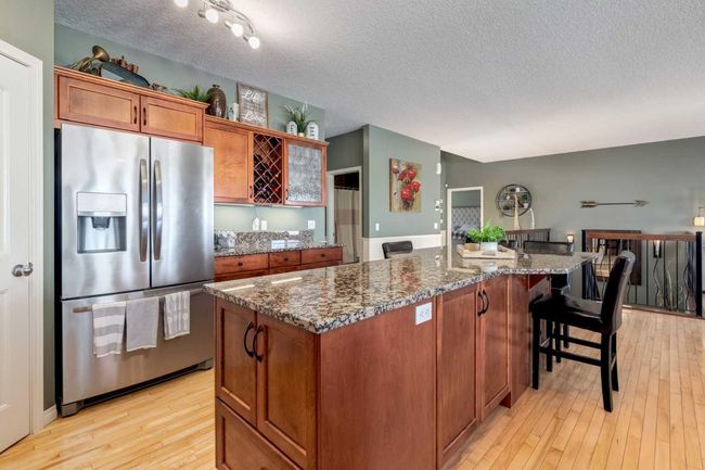 569 Boulder Creek Circle Se, House other with 4 bedrooms, 3 bathrooms and 6 parking in Langdon AB | Image 14