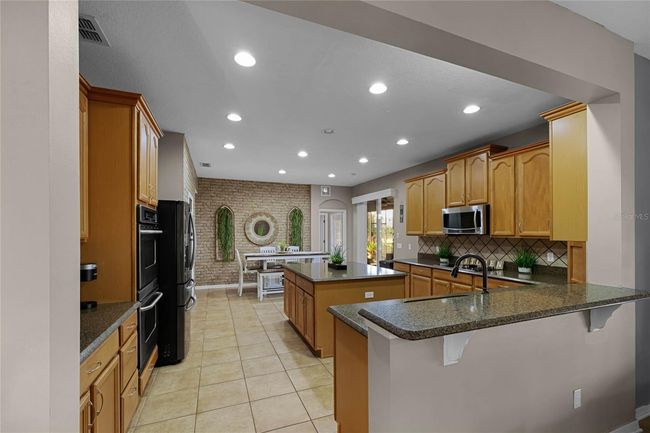 7621 Brightwater Pl, House other with 6 bedrooms, 5 bathrooms and null parking in OVIEDO FL | Image 9