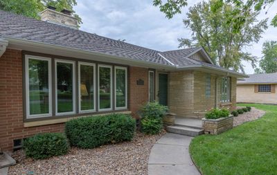 Ranch-style house featuring a front lawn | Image 2