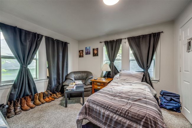 Bedroom with carpet floors | Image 8