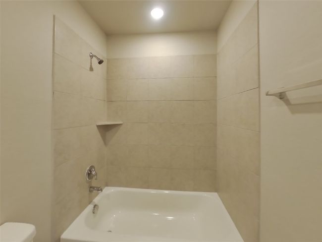 Full bathroom with toilet, shower / tub combination, and recessed lighting | Image 12