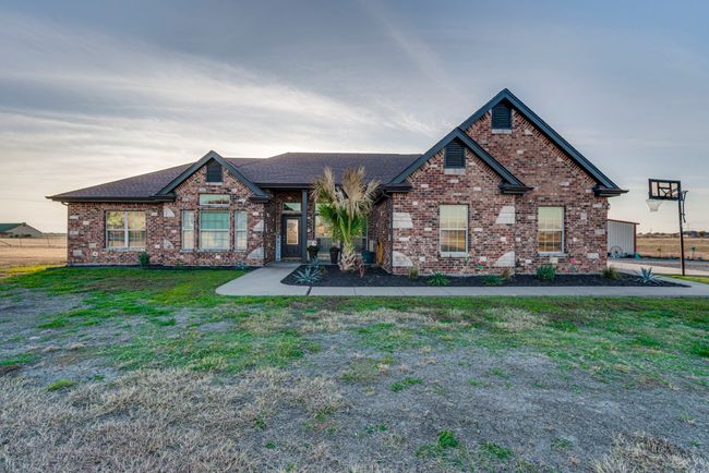 View of front of home with a lawn | Image 4