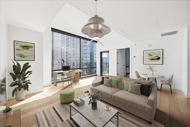 Living area with wood finished floors and baseboards | Image 5