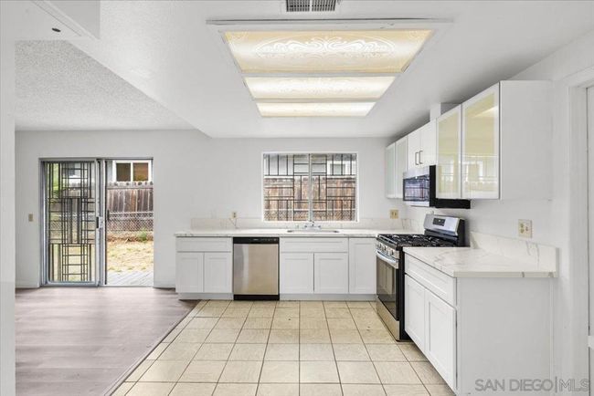 9616 Apple St, House other with 3 bedrooms, 2 bathrooms and 4 parking in Spring Valley CA | Image 4