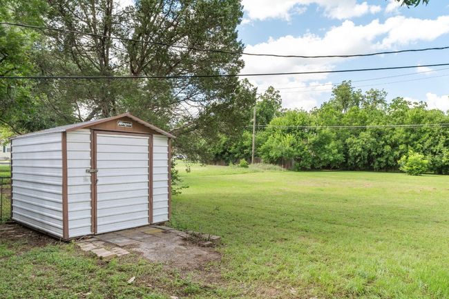Shed next to carport and extended lot | Image 35