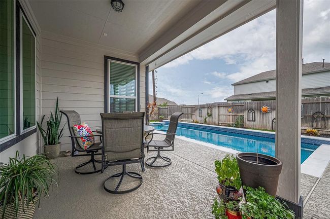 Whether you're hosting weekend BBQs, floating in the sun, or enjoying evening swims under the Texas sky, this home was built for those who live for poolside relaxation and outdoor gatherings. | Image 45