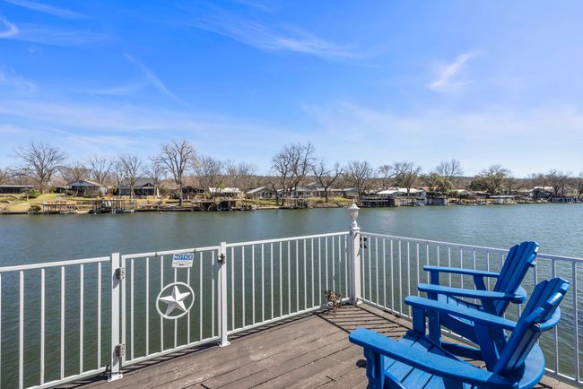 Wooden deck featuring a water view | Image 25