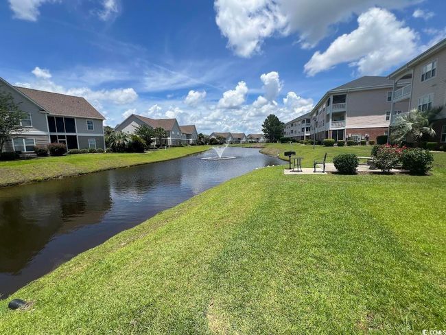 Water view with nearby suburban area | Image 15