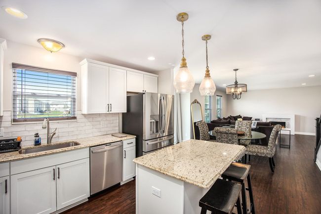 well-appointed kitchen with granite countere | Image 6
