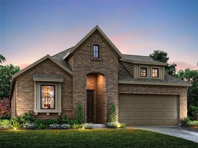 View of front of property with a garage and a lawn | Image 1