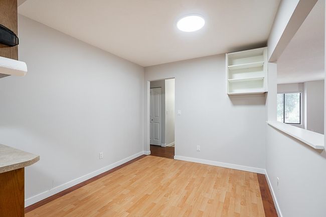 Spare room with light wood-style flooring and baseboards | Image 11