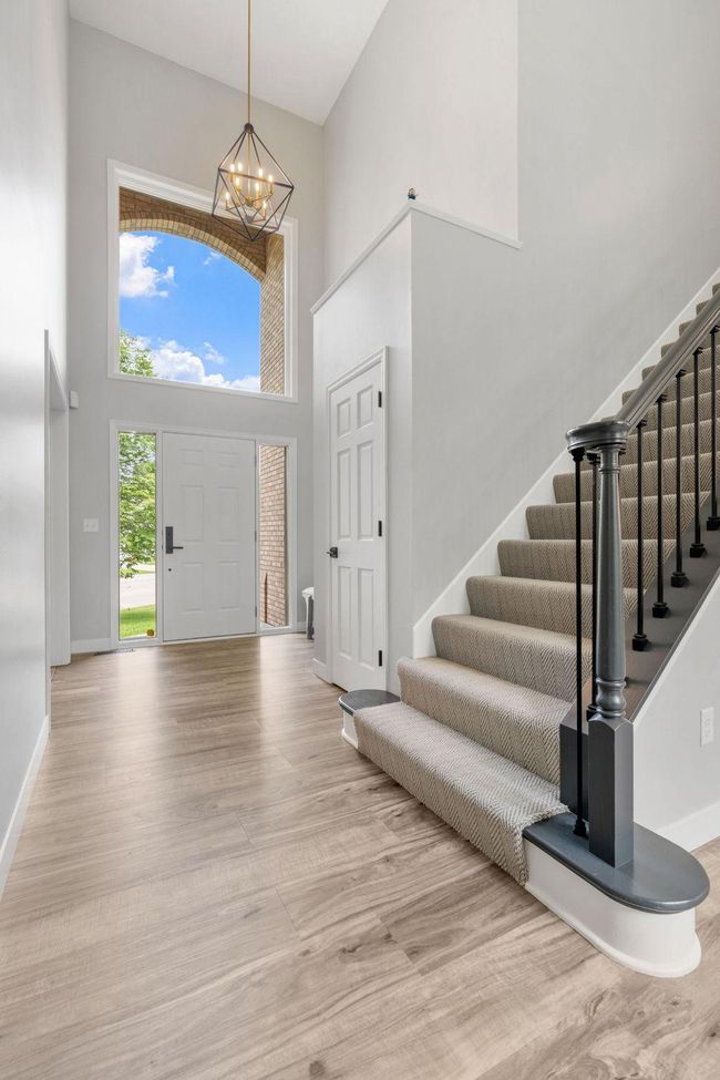 The beautiful runner on the staircase leads you to a open landing area where you will find three bedrooms and full bathroom. | Image 24